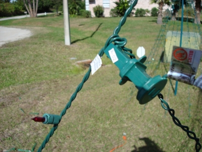 Eventually you will get to one of these.  Undo the knot, unplug, and continue to remove the sets.